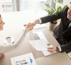 business-partners-celebrating-contract-signing